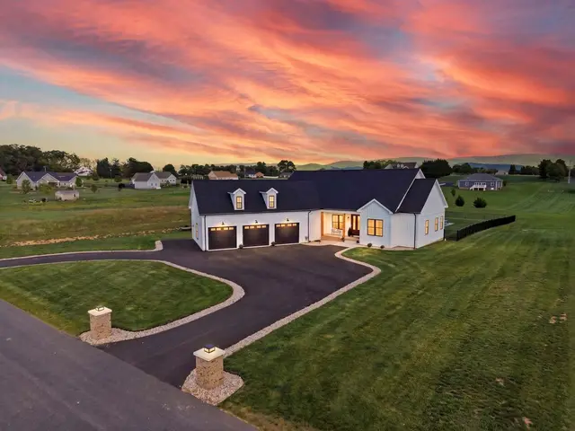 Aerial drone photo of a farmhouse property at dusk, Rockbridge County VA